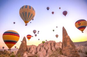 Catch a hot air balloon ride in Cappadocia, Turkey.